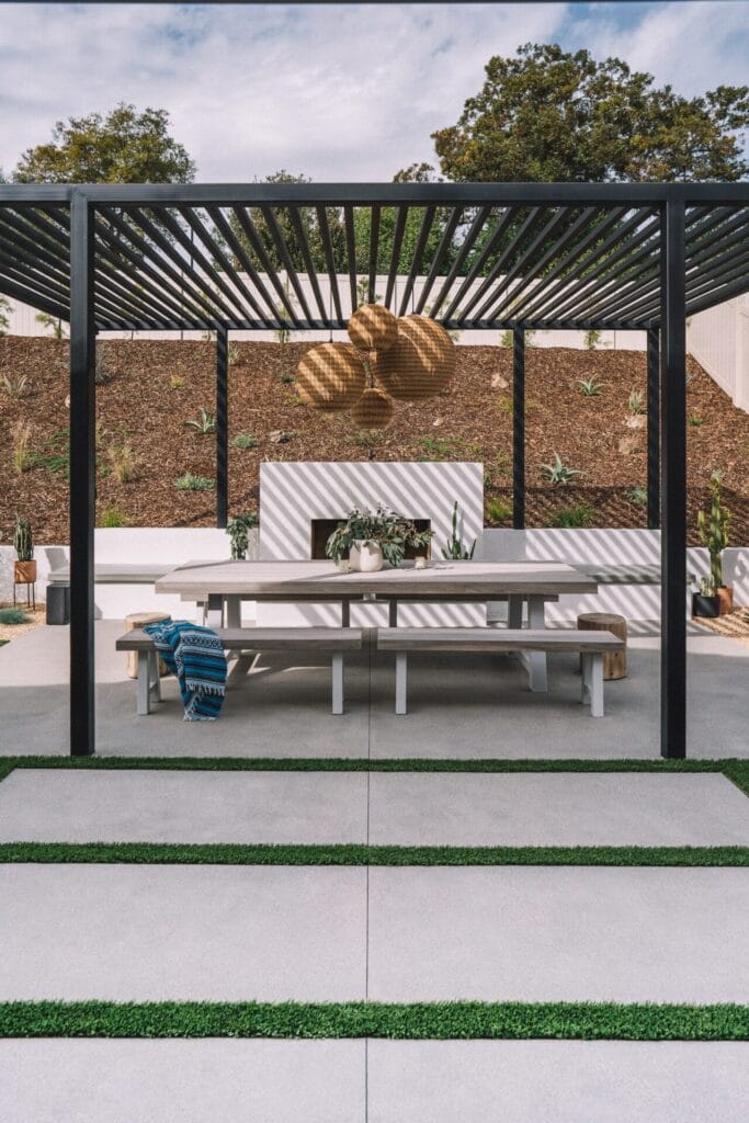 beautiful-view-of-an-outdoor-dining-area-with-a-pergola