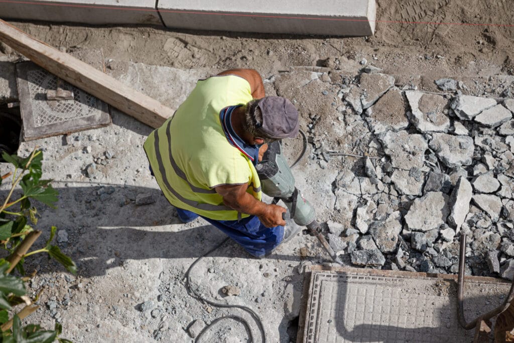 construction worker with jackhammer drilling concr 2023 11 27 04 53 41 utc