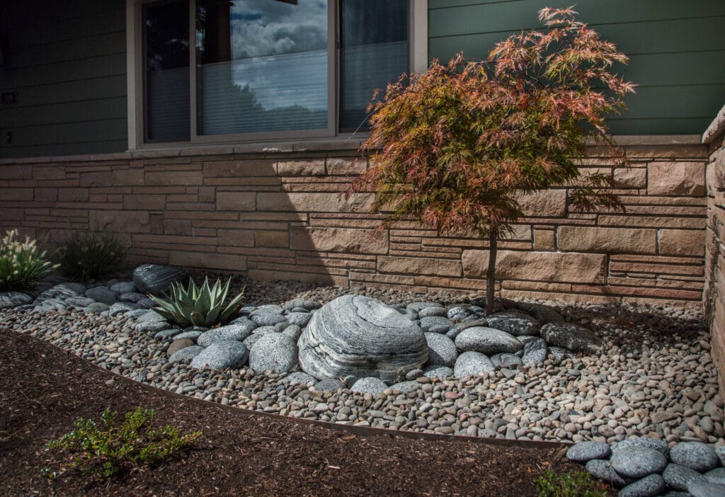 washed river gravel flowerbed