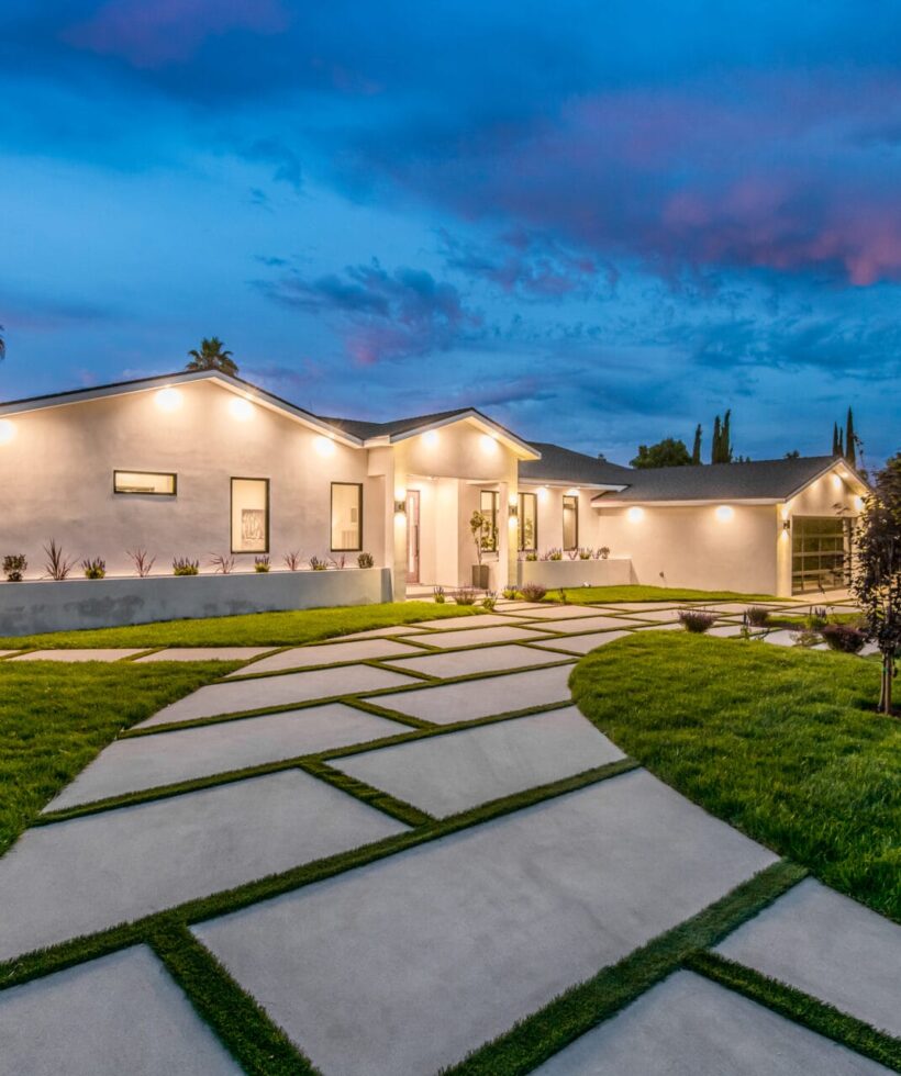 a modern new construction home in los angeles at sunset